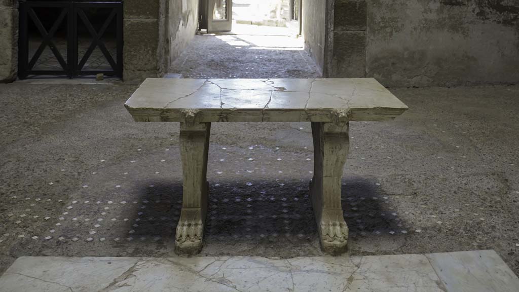 III.11 Herculaneum. August 2021. Room 6, looking east towards marble table and entrance doorway. Photo courtesy of Robert Hanson.